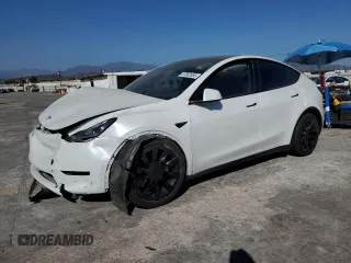 2023 Tesla Model Y Long Range z VIN 7SAYGDEE4PA053094, wystawiony jako Copart lot #57853555 z przebiegiem 20 951 mil mil oraz Szkoda całkowita • Salvage title. Historia ofert i sprzedaży dostępna na DreamBid. Obrazek 1.