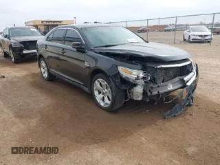 2011 Ford Taurus SEL with VIN 1FAHP2EW1BG177504, listed as a IAAI auction lot 41578564 with 243,855 mi miles. Bid and sale history available at carsss.com. Image 1.