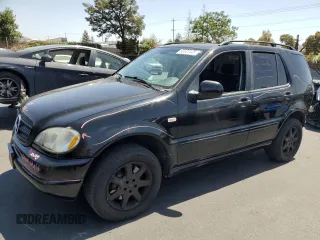 2000 Mercedes-Benz M 320/430/500 with VIN 4JGAB72EXYA193906, listed as a Copart auction lot 62025125 with 142,808 mi miles and Salvage title. Bid and sale history available at DreamBid. Image 1.
