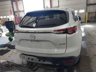 2020 Mazda CX-9 Touring z VIN JM3TCBCY8L0405360, wystawiony jako IAAI lot #41419428 z przebiegiem 69 917 mil mil oraz . Historia ofert i sprzedaży dostępna na DreamBid. Obrazek 16.