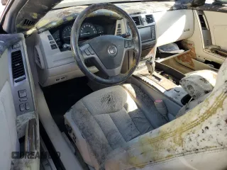 2006 Cadillac XLR z VIN 1G6YX36D965602114, wystawiony jako Copart lot #80151794 z przebiegiem Nie podano mil oraz Szkody całkowita. Historia ofert i sprzedaży dostępna na DreamBid. Obrazek 8.