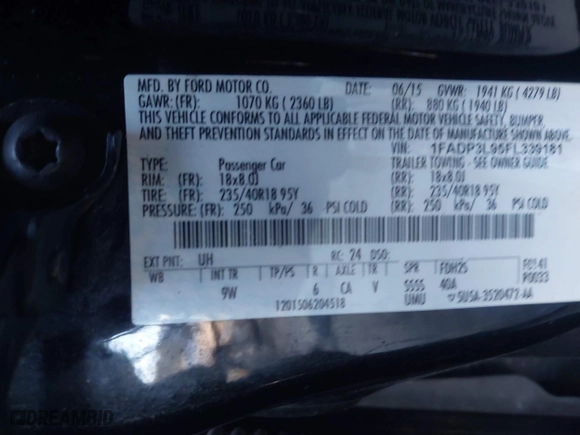 2015 Ford Focus ST with VIN 1FADP3L95FL339181, listed as a IAAI auction lot 41397051 with 124,656 mi miles. Bid and sale history available at carsss.com. Image 9.