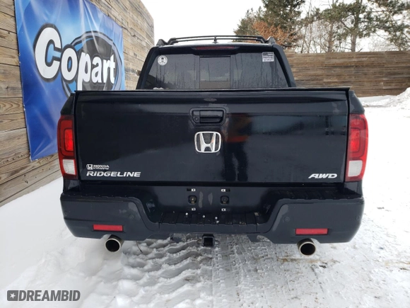 2021 Honda Ridgeline RTL-E with VIN 5FPYK3F79MB010074, listed as a Copart auction lot 83973564 with 44,058 mi miles and Clean Title. Bid and sale history available at carsss.com. Image 6.