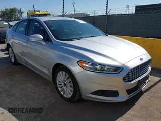 2015 Ford Fusion SE Hybrid with VIN 3FA6P0LUXFR296373, listed as a IAAI auction lot 42600980 with 76,985 mi miles and . Bid and sale history available at DreamBid. Image 1.