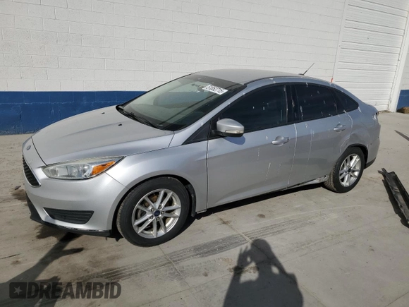 2016 Ford Focus SE with VIN 1FADP3F28GL270003, listed as a Copart auction lot 51852715 with 157,665 mi miles and Salvage Title. Bid and sale history available at DreamBid. Image 1.