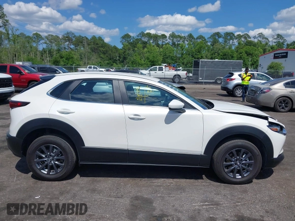 2024 Mazda CX-30 S z VIN 3MVDMBAM6RM615440, wystawiony jako IAAI lot #42265517 z przebiegiem 11 826 mil mil oraz . Historia ofert i sprzedaży dostępna na DreamBid. Obrazek 13.