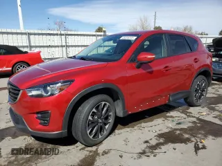 2016 Mazda CX-5 Grand Touring z VIN JM3KE4DY0G0892219, wystawiony jako Copart lot #48326205 z przebiegiem 83 289 mil mil oraz Szkoda całkowita • Salvage title. Historia ofert i sprzedaży dostępna na DreamBid. Obrazek 1.