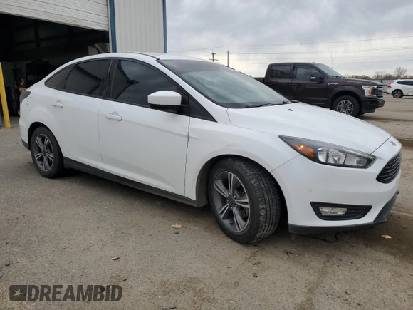 2018 Ford Focus SE with VIN 1FADP3FE5JL230334, listed as a Copart auction lot 50656965 with 91,272 mi miles and Salvage Title. Bid and sale history available at carsss.com. Image 4.