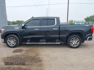 2020 GMC Sierra 1500 SLT z VIN 1GTU9DED8LZ240956, wystawiony jako IAAI lot #42296791 z przebiegiem 153 636 mil mil oraz . Historia ofert i sprzedaży dostępna na DreamBid. Obrazek 14.