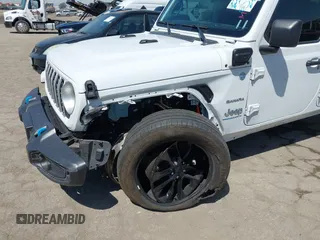 2024 Jeep Wrangler Sahara with VIN 1C4RJXP61RW126904, listed as a IAAI auction lot 41998215 with 32,034 mi miles and . Bid and sale history available at DreamBid. Image 6.