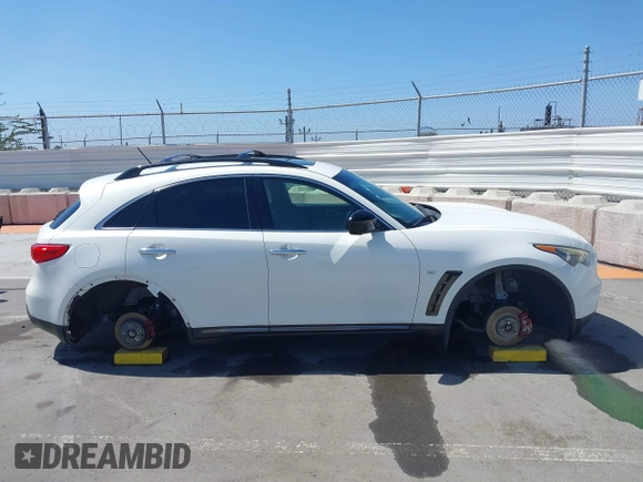 2016 Infiniti QX70 with VIN JN8CS1MW1GM750798, listed as a IAAI auction lot 42519800 with 139,940 mi miles and . Bid and sale history available at DreamBid. Image 14.