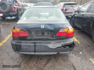 1999 Honda Civic EX with VIN 1HGEJ8644XL037266, listed as a IAAI auction lot 41254910 with 171,509 mi miles. Bid and sale history available at carsss.com. Image 6.