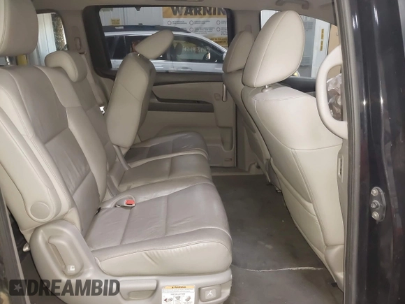 2013 Honda Odyssey EX-L с VIN 5FNRL5H63DB052881, выставлен на аукционе IAAI как лот 42182363 с пробегом 235 481 миль миль и . История ставок и продаж доступна на DreamBid. Изображение 8.