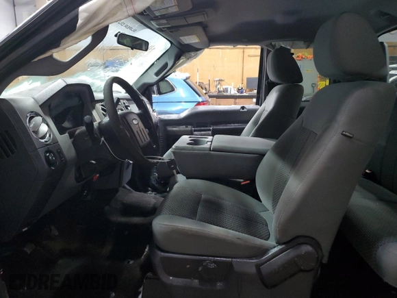 2011 Ford F-250 XL with VIN 1FT7X2BT3BEA11867, listed as a Copart auction lot 82906164 with 206,888 mi miles and Salvage Title. Bid and sale history available at DreamBid. Image 7.