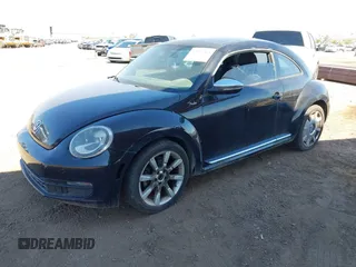 2013 Volkswagen Beetle 2.5L with VIN 3VWJP7ATXDM679115, listed as a IAAI auction lot 42212965 with Not Provided miles and . Bid and sale history available at DreamBid. Image 17.