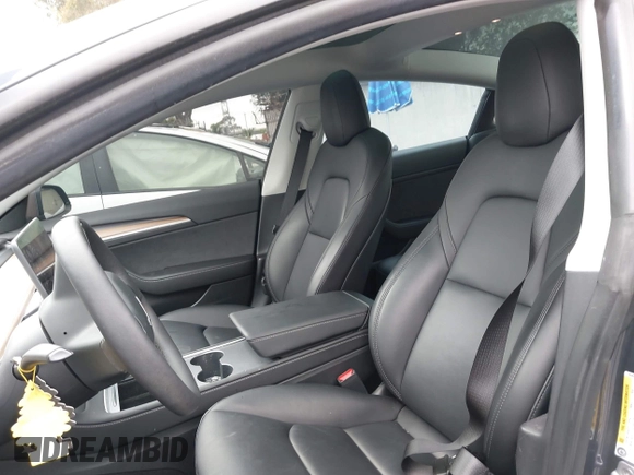 2023 Tesla Model 3 z VIN 5YJ3E1EAXPF403095, wystawiony jako IAAI lot #42151764 z przebiegiem 17 872 mil mil oraz . Historia ofert i sprzedaży dostępna na DreamBid. Obrazek 21.