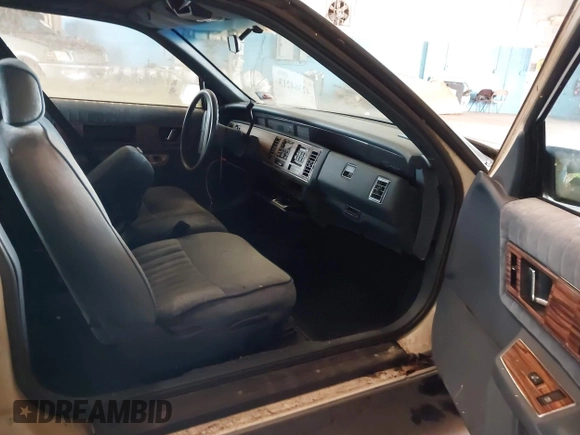 1990 Buick Regal with VIN 2G4WB14LXL1458244, listed as a IAAI auction lot 42364213 with 45,816 mi miles and . Bid and sale history available at DreamBid. Image 5.