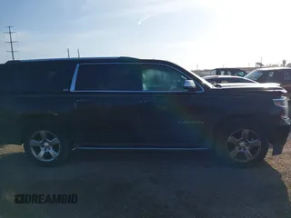 2016 Chevrolet Suburban LTZ with VIN 1GNSCJKC9GR212874, listed as a IAAI auction lot 41125926 with 82,714 mi miles and . Bid and sale history available at DreamBid. Image 13.