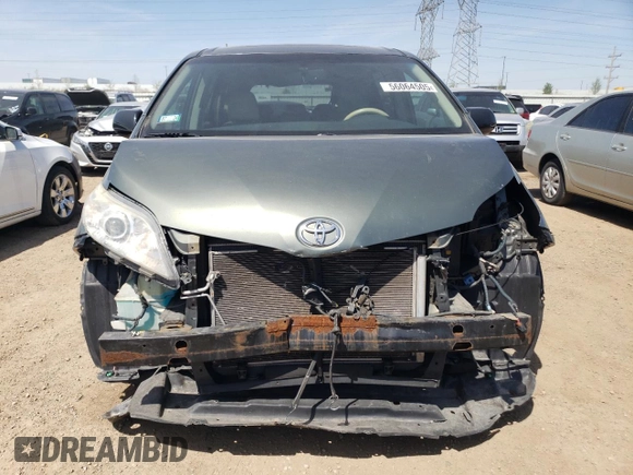 2013 Toyota Sienna XLE AAS с VIN 5TDYK3DC2DS313685, выставлен на аукционе Copart как лот 56064505 с пробегом 115 624 миль миль и Списание • Salvage title. История ставок и продаж доступна на DreamBid. Изображение 5.