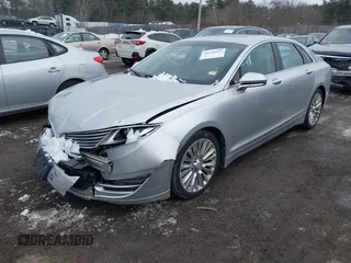 2013 Lincoln MKZ with VIN 3LN6L2J96DR800877, listed as a IAAI auction lot 41256557 with 125,584 mi miles. Bid and sale history available at carsss.com. Image 2.