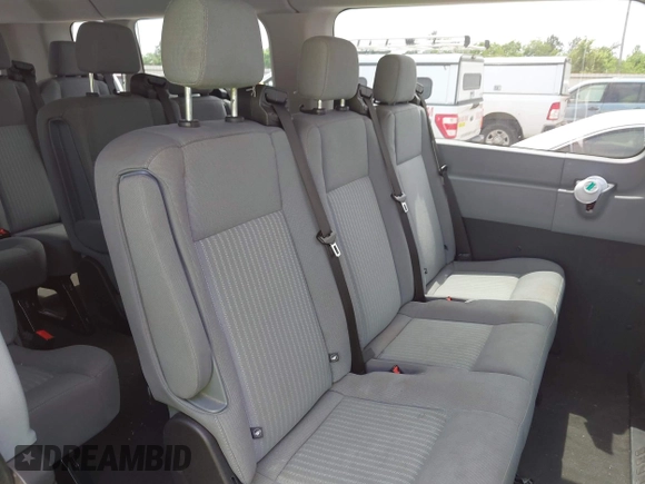 2017 Ford Transit Wagon XL with VIN 1FBZX2ZG1HKA73221, listed as a IAAI auction lot 42052034 with 79,809 mi miles. Bid and sale history available at carsss.com. Image 8.