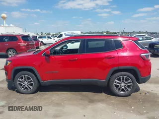2017 Jeep Compass Latitude with VIN 3C4NJCBB2HT668657, listed as a IAAI auction lot 42027025 with 91,888 mi miles and . Bid and sale history available at DreamBid. Image 14.