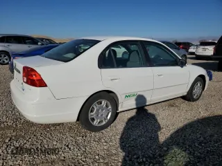2002 Honda Civic z VIN 1HGEN26532L000390, wystawiony jako Copart lot #80095344 z przebiegiem 162 638 mil mil oraz Czysty tytuł • Clean title. Historia ofert i sprzedaży dostępna na DreamBid. Obrazek 3.