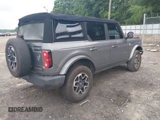 2021 Ford Bronco with VIN 1FMDE5DH9MLA62853, listed as a IAAI auction lot 42413256 with 65,000 mi miles and . Bid and sale history available at DreamBid. Image 4.
