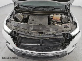 2023 Chevrolet Traverse LT Cloth with VIN 1GNERGKW2PJ135658, listed as a Copart auction lot 50096105 with 77,398 mi miles and Clean Title. Bid and sale history available at carsss.com. Image 12.