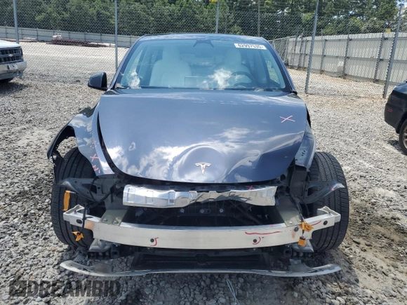 2022 Tesla Model Y Performance with VIN 7SAYGDEF3NF532311, listed as a Copart auction lot 62997535 with 60,530 mi miles and Salvage title. Bid and sale history available at DreamBid. Image 5.