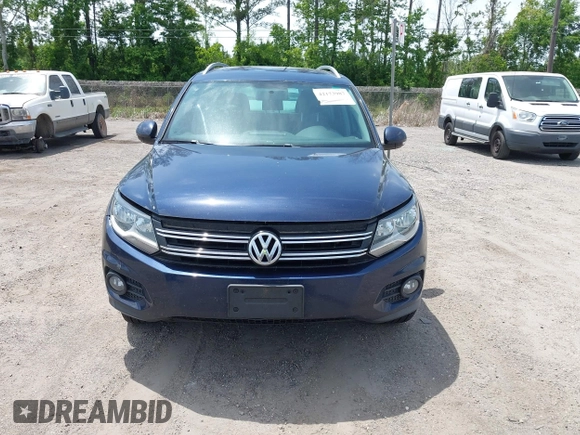 2012 Volkswagen Tiguan SEL with VIN WVGAV7AX7CW608637, listed as a IAAI auction lot 42173987 with 149,013 mi miles and . Bid and sale history available at DreamBid. Image 6.