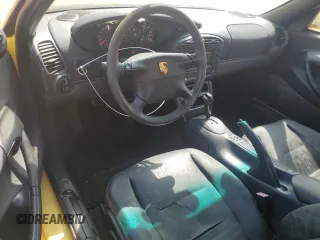 1998 Porsche Boxster с VIN WP0CA2982WU623104, выставлен на аукционе Copart как лот 50941005 с пробегом 78 486 миль миль и Чистый • Clean title. История ставок и продаж доступна на DreamBid. Изображение 8.