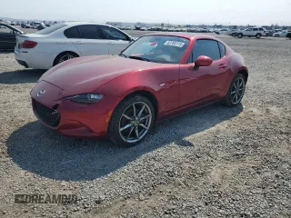 2021 Mazda MX-5 Miata Grand Touring with VIN JM1NDAM76M0454265, listed as a Copart auction lot 63705115 with Not provided miles and Salvage title. Bid and sale history available at DreamBid. Image 1.