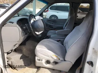 1997 Ford F-150 z VIN 1FTDX0766VKA86983, wystawiony jako Copart lot #50896215 z przebiegiem 214 746 mil mil oraz Szkoda całkowita • Salvage title. Historia ofert i sprzedaży dostępna na DreamBid. Obrazek 7.