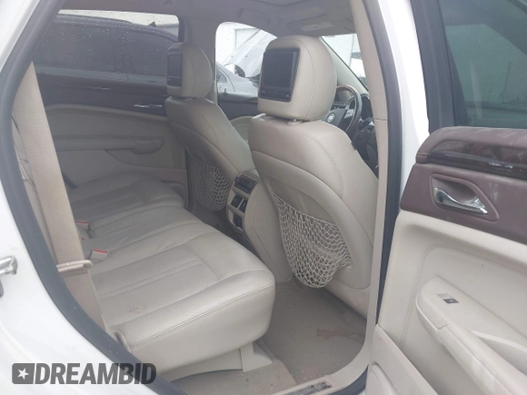 2010 Cadillac SRX Premium Collection with VIN 3GYFNFEY2AS562287, listed as a IAAI auction lot 42420409 with 195,694 mi miles and . Bid and sale history available at DreamBid. Image 8.