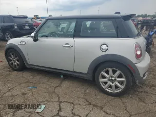 2011 MINI Hardtop S with VIN WMWSV3C58BTY11580, listed as a Copart auction lot 62081615 with 112,336 mi miles and Salvage title. Bid and sale history available at DreamBid. Image 2.