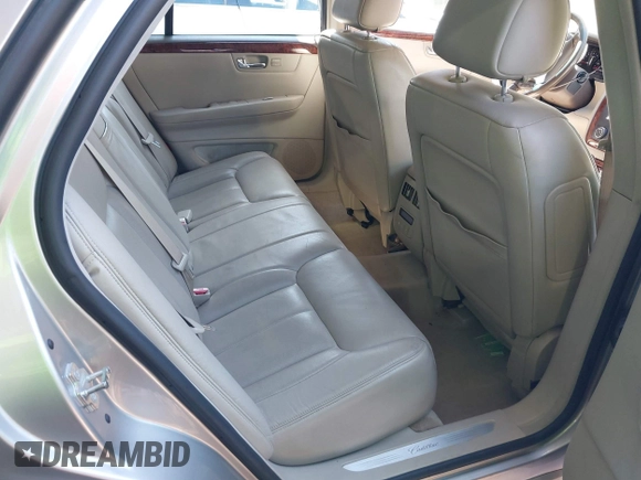 2006 Cadillac DTS w/1SC with VIN 1G6KD57Y46U165978, listed as a IAAI auction lot 41854728 with 116,455 mi miles. Bid and sale history available at carsss.com. Image 8.