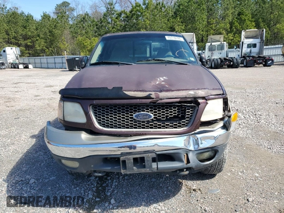2000 Ford F-150 XL with VIN 1FTRX18L4YNA99427, listed as a Copart auction lot 49718795 with 0 mi miles and Salvage Title. Bid and sale history available at carsss.com. Image 5.