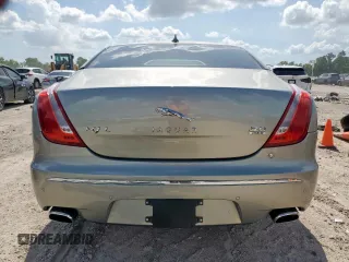 2013 Jaguar XJ Portfolio with VIN SAJWJ2GD5D8V49505, listed as a Copart auction lot 61171955 with 129,158 mi miles and Salvage title. Bid and sale history available at DreamBid. Image 6.