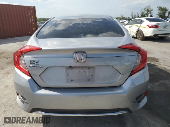 2019 Honda Civic LX with VIN 2HGFC2F69KH567767, listed as a Copart auction lot 52069575 with 102,259 mi miles and Non Repairable. Bid and sale history available at DreamBid. Image 6.