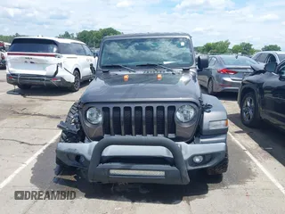 2019 Jeep Wrangler Unlimited Sport S with VIN 1C4HJXDN4KW577273, listed as a IAAI auction lot 42435847 with 69,403 mi miles and . Bid and sale history available at DreamBid. Image 12.