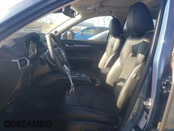 2020 Mazda CX-5 Touring with VIN JM3KFACM8L0774374, listed as a Copart auction lot 42870895 with 71,925 mi miles and Salvage Title. Bid and sale history available at DreamBid. Image 7.