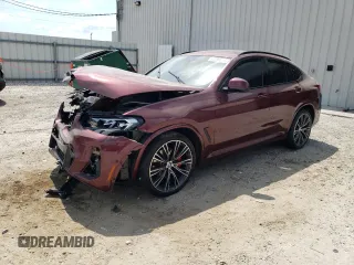 2022 BMW X4 xDrive30i with VIN 5UX33DT05N9M07482, listed as a Copart auction lot 57596515 with Not provided miles and Salvage title. Bid and sale history available at DreamBid. Image 1.