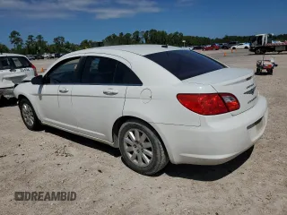 2010 Chrysler Sebring Touring with VIN 1C3CC4FB6AN149008, listed as a Copart auction lot 70683024 with 193,732 mi miles and Salvage Title. Bid and sale history available at carsss.com. Image 2.