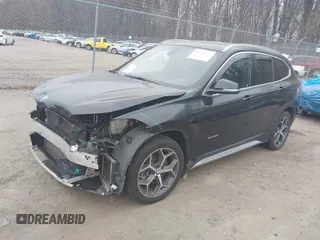 2017 BMW X1 xDrive28i with VIN WBXHT3C31H5F72958, listed as a IAAI auction lot 41782257 with 134,829 mi miles. Bid and sale history available at carsss.com. Image 17.