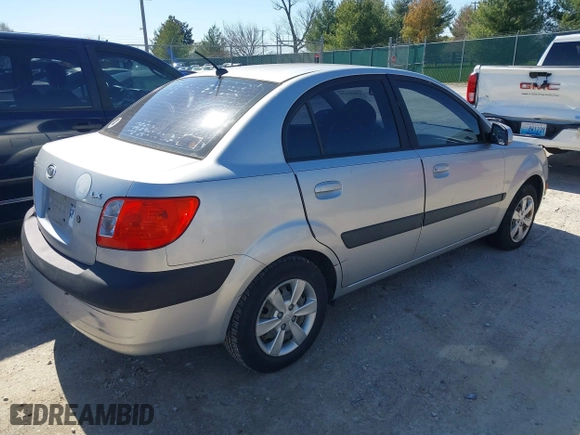 2008 Kia Rio LX with VIN KNADE123X86329097, listed as a IAAI auction lot 41822420 with 180,462 mi miles. Bid and sale history available at carsss.com. Image 4.