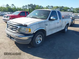 2002 Ford F-150 XL with VIN 1FTRX17272NA51467, listed as a IAAI auction lot 42095907 with 1 mi miles. Bid and sale history available at carsss.com. Image 2.