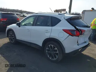 2016 Mazda CX-5 Grand Touring with VIN JM3KE4DYXG0836692, listed as a IAAI auction lot 41812584 with 119,302 mi miles. Bid and sale history available at carsss.com. Image 3.