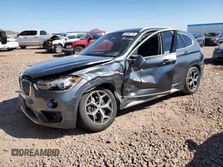 2017 BMW X1 xDrive28i with VIN WBXHT3C32H5F79403, listed as a Copart auction lot 50182775 with 71,003 mi miles and Salvage Title. Bid and sale history available at carsss.com. Image 1.
