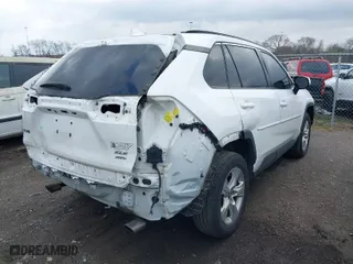 2019 Toyota RAV4 XLE with VIN 2T3P1RFV1KW079440, listed as a IAAI auction lot 41521054 with 215,822 mi miles. Bid and sale history available at carsss.com. Image 4.
